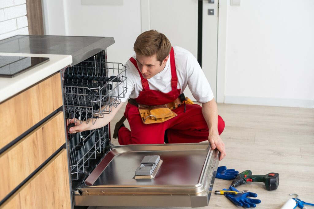Master of Maintenance: Young Man Providing Home Appliance Repair Services